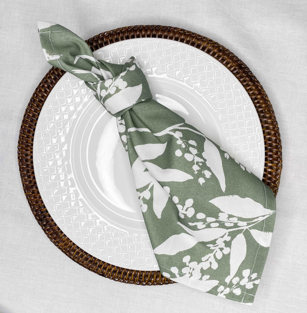 Set of stylish sage green and berry napkins for elegant table settings